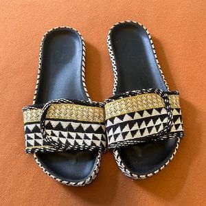 SOLD. Tribal print slides. Gently used. Size 6.5.